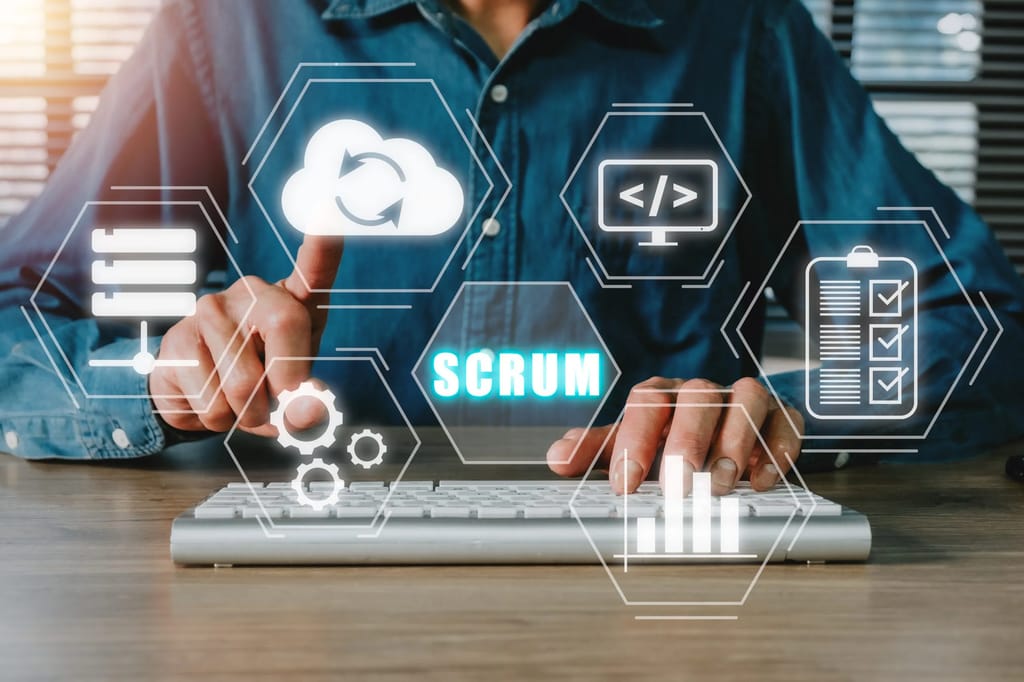 SCRUM, Man hand using laptop computer with SCRUM icon on VR screen