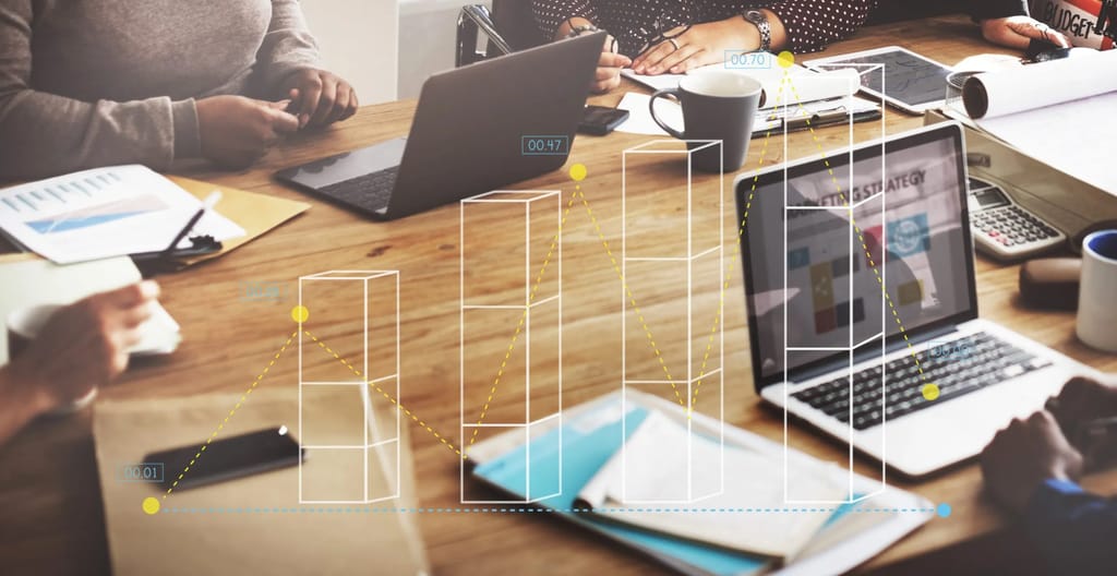Bar Chart with open laptop in the background